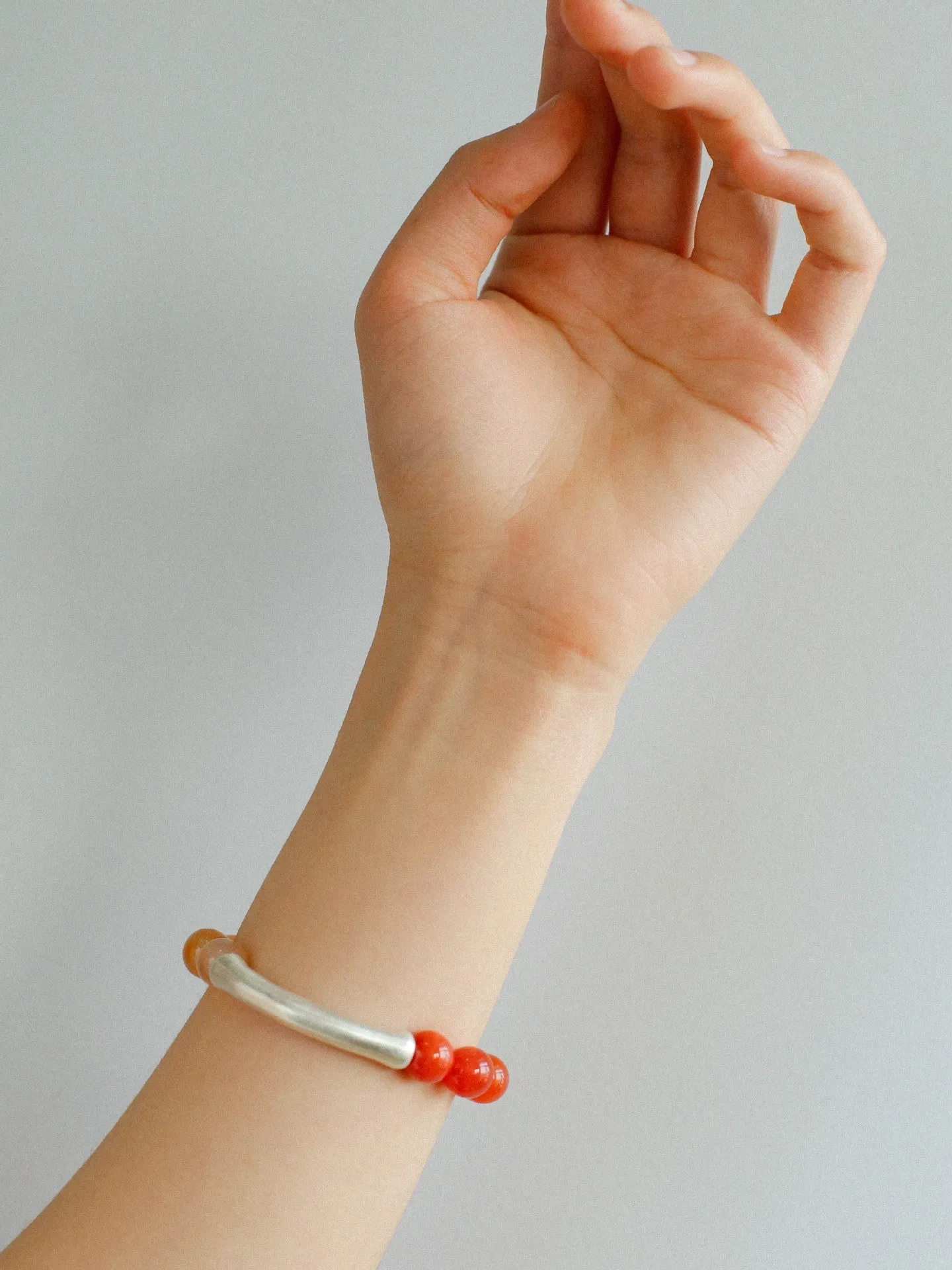 Red Onyx Gradient Silver Tube Stretch Bracelet